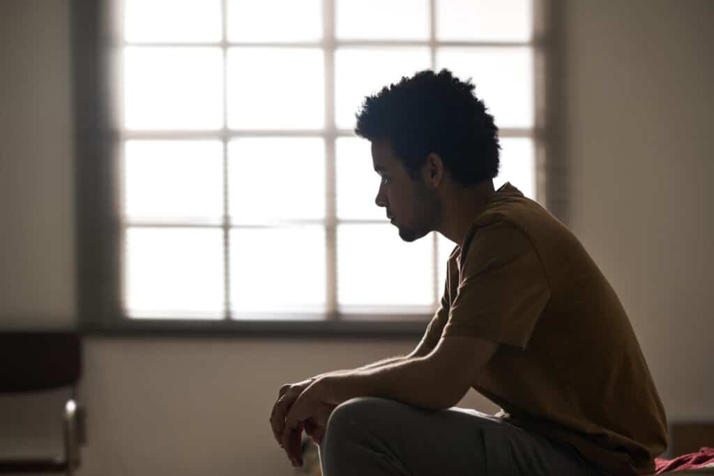 Sad man worried about his problems, psychotherapy and counseling