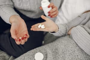 person struggling drinking medication, combined and medication massachusetts