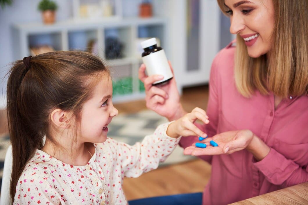 Psychopharmacologist handing medication to a child during a consultation