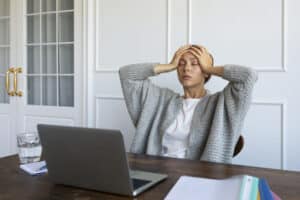 Stressed woman sitting on a chair