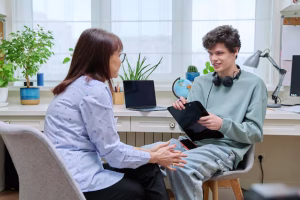 Woman and boy talking during a consultation