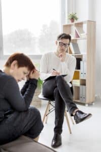a therapist and old woman on a therapy session, mood depression and depression massachusetts
