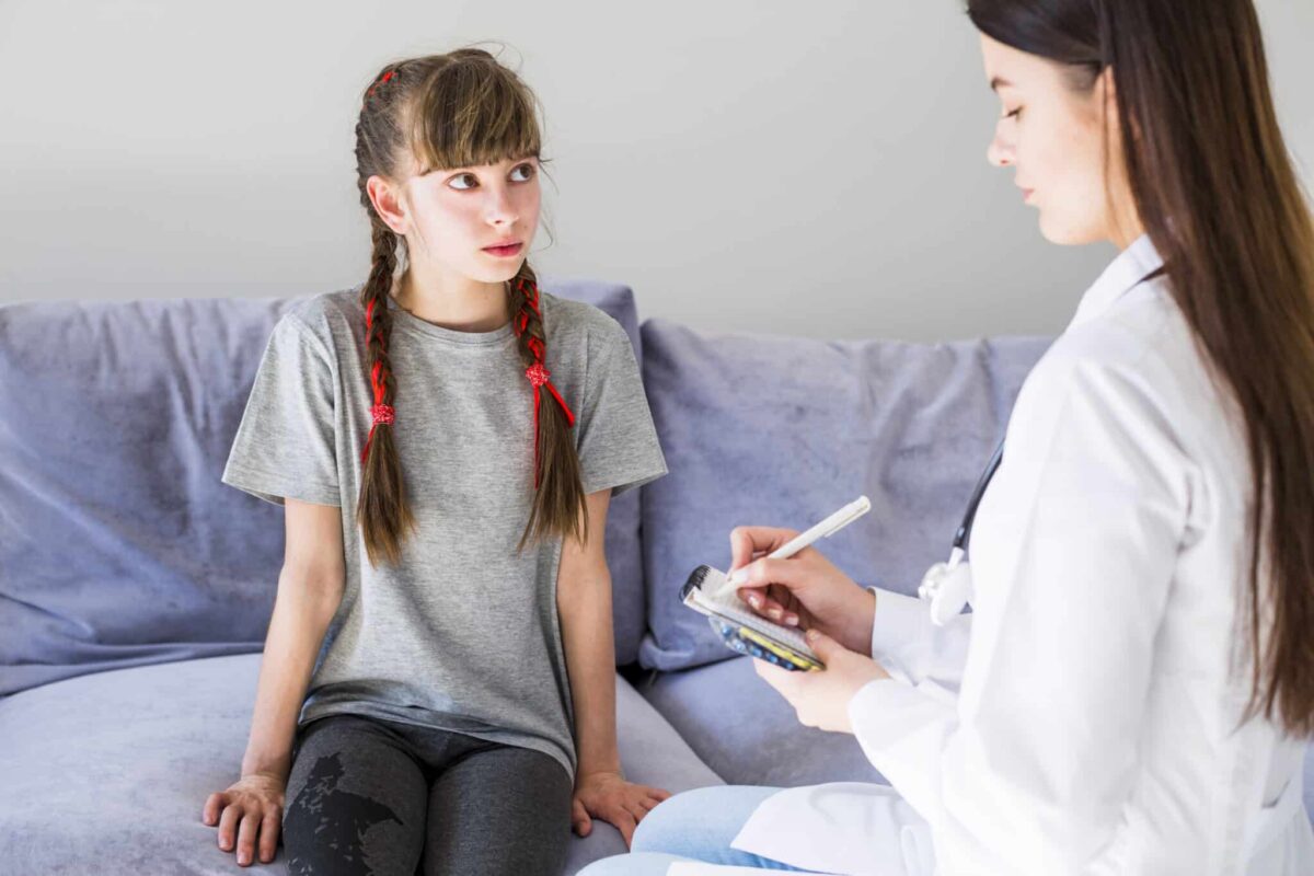 child being examined by a child psychiatrist in massachusetts