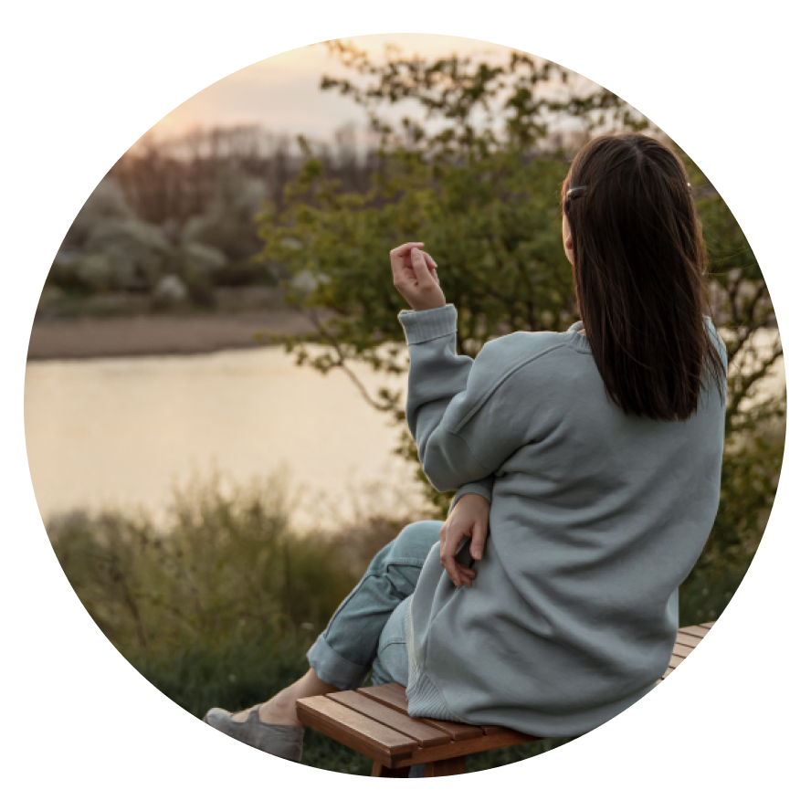 Boston Premier Psychiatry Woman Sitting on Bench to Relax Wellesley Massachusetts