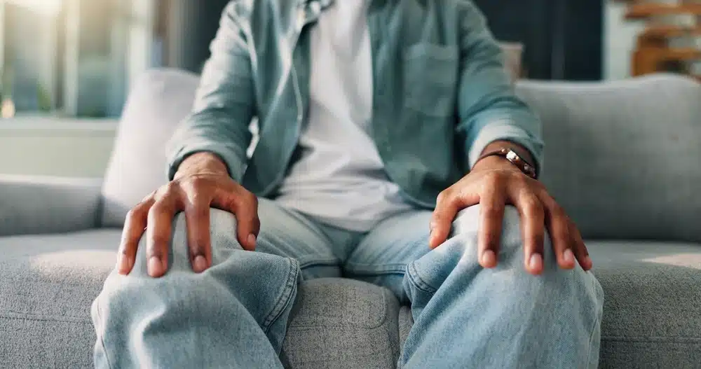 person on sofa in ptsd - psychopharmacology boston anxiety medication review near Chinatown Gate Boston MA